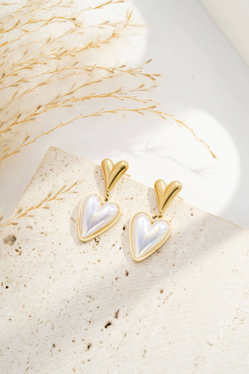 Boucle d’oreille cœur irisé élégant, double motif lumineux
