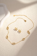 Parure collier boucle d'oreille maille marine doré